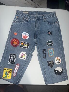 Cool Unisex Levi's Blue Denim Jeans with Multicolor Patches